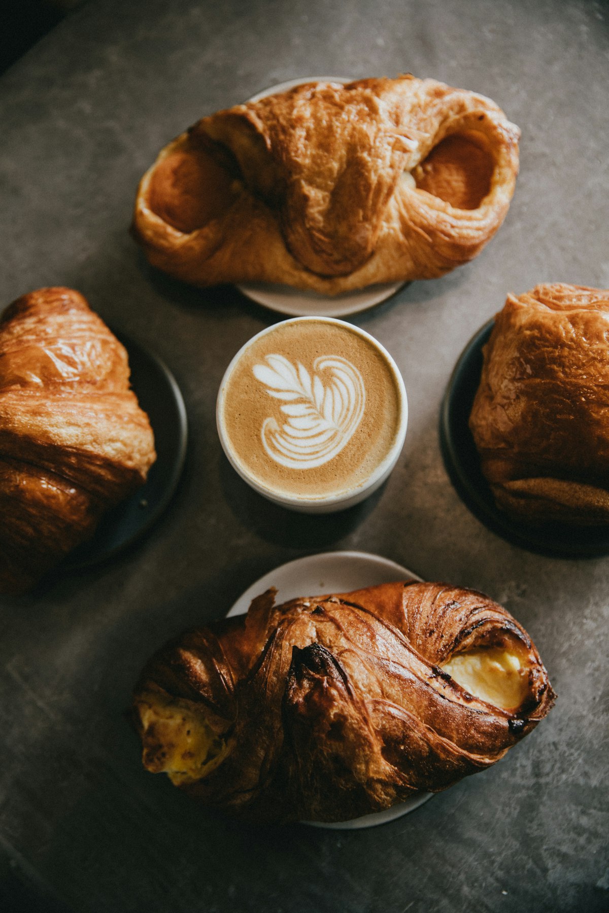 Warm coffee and fresh pastries on a table, a cozy and comforting moment