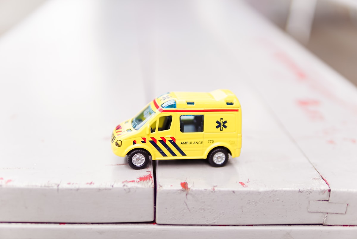 A small toy ambulance, a gentle reminder of when to seek medical care